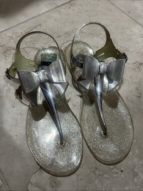 BCBGeneration Silver Glitter Bow Jelly Sandals